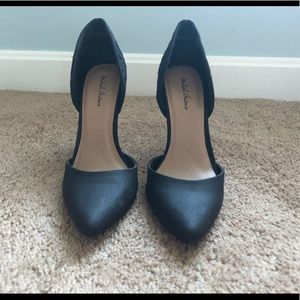 Black pointed toe pumps